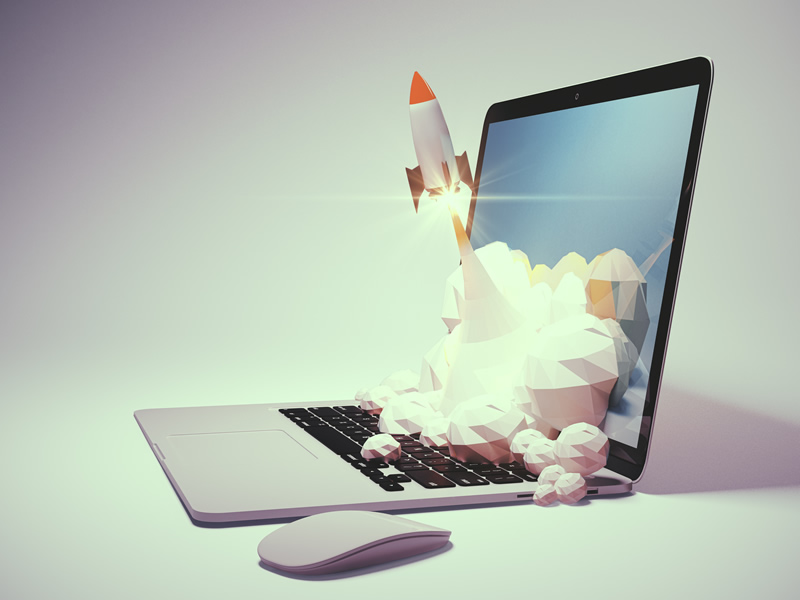 Model of rocket launching from open laptop