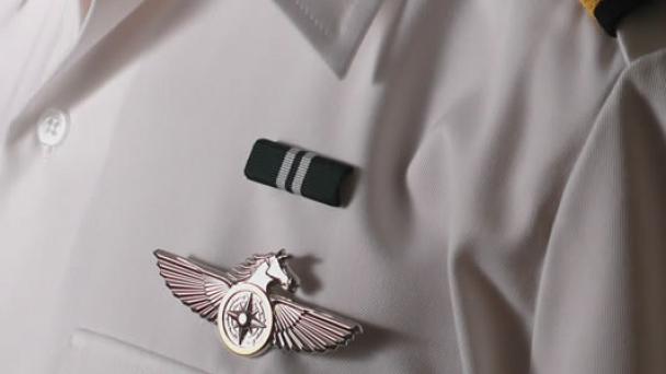 Closeup of day uniform badge and decoration