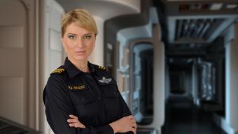 Warrant officer standing in corridor