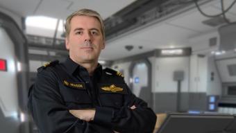 Engineering officer standing in engine room